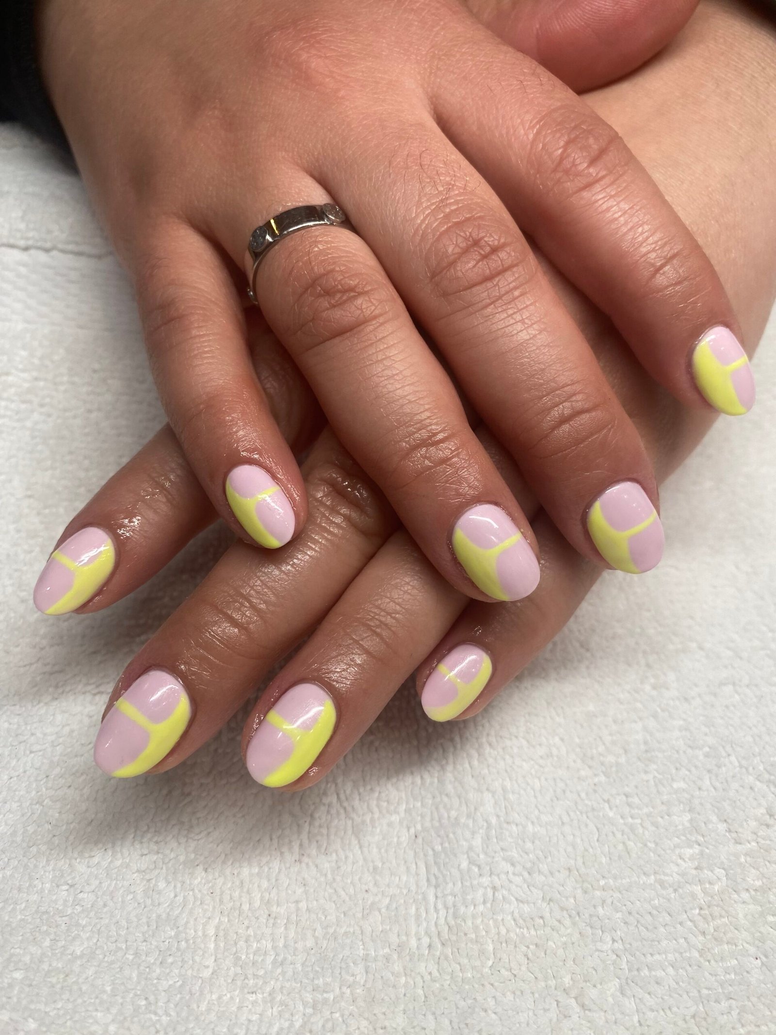 Professional nail technician providing expert service