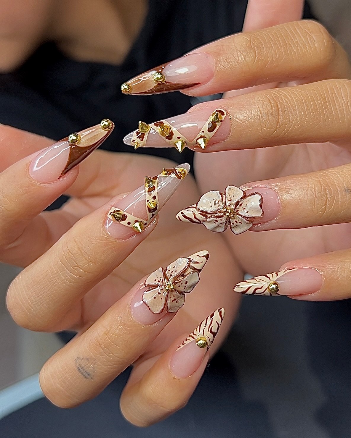 Professional nail technician providing expert service